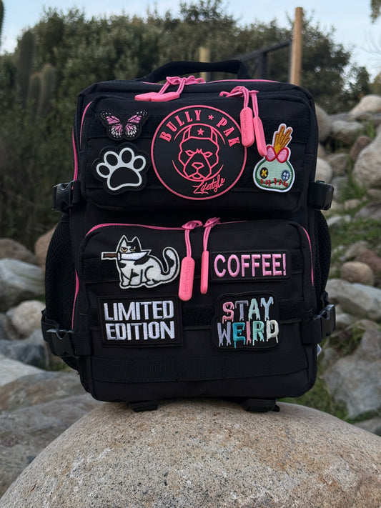 Mochila Minibully 9 Litros PRO. Negra cierres fucsia