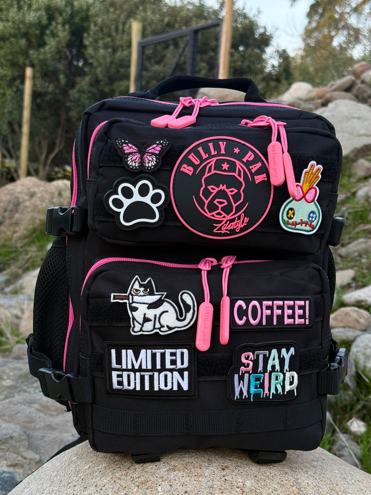 Mochila Minibully 9 Litros PRO. Negra cierres fucsia