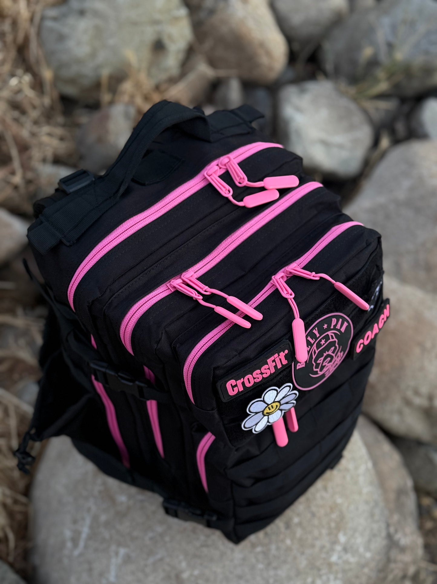 Mochila BULLYpak 45 Litros PRO. Negra cierres Fucsia