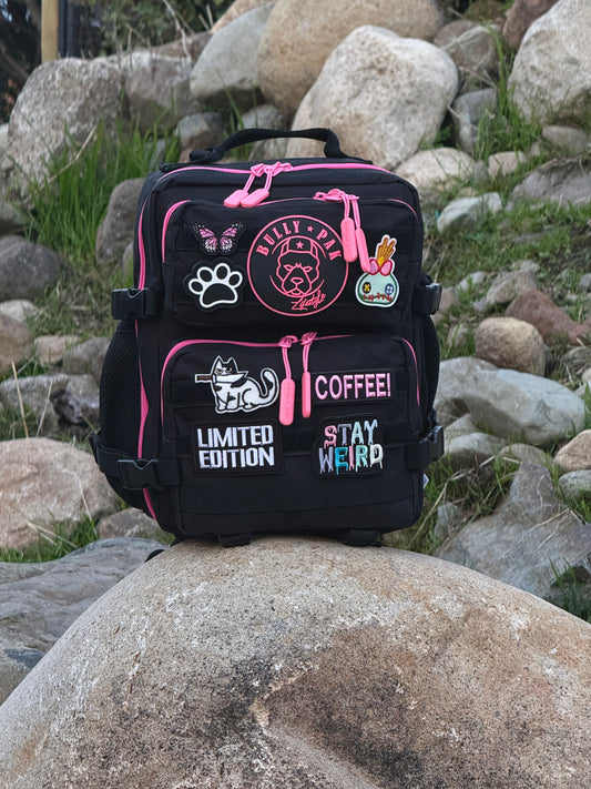 Mochila Minibully 9 Litros PRO. Negra cierres fucsia