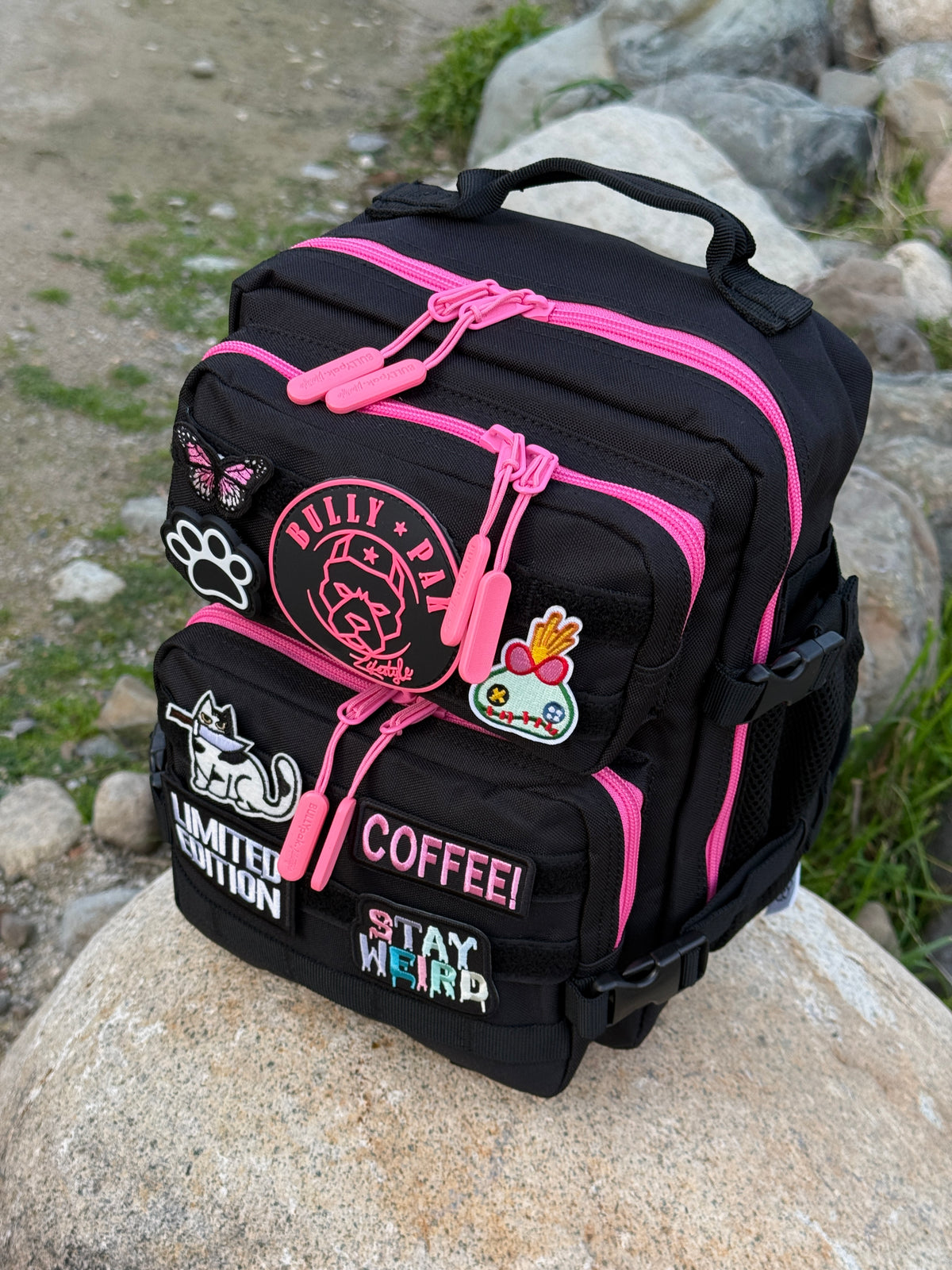 Mochila Minibully 9 Litros PRO. Negra cierres fucsia