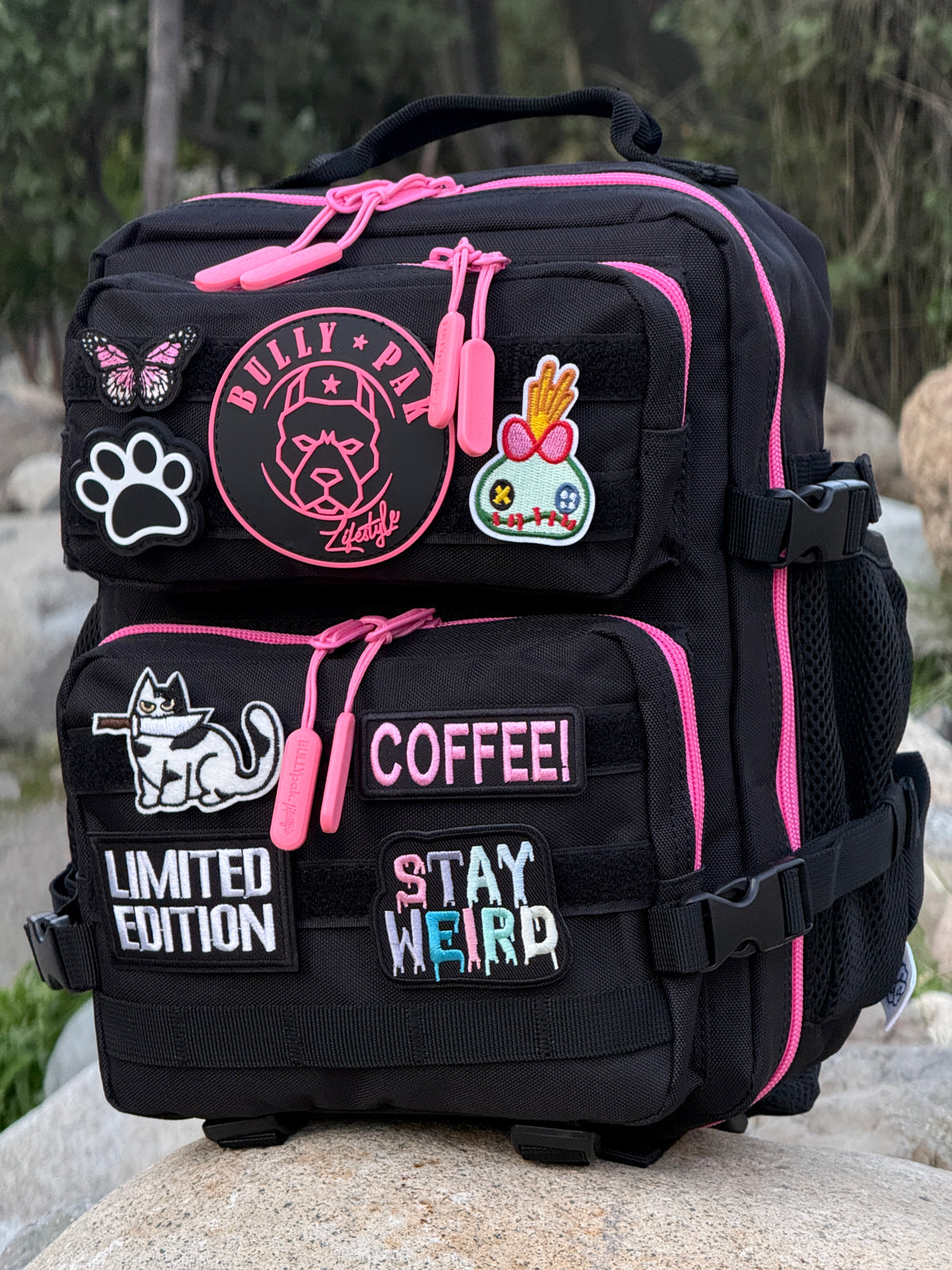 Mochila Minibully 9 Litros PRO. Negra cierres fucsia