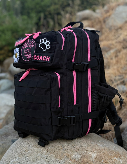 Mochila BULLYpak 25 Litros PRO. Negra cierres Fucsia