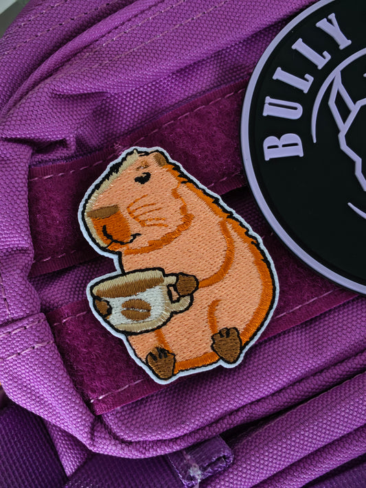 Parche Capibara tomando Cafe